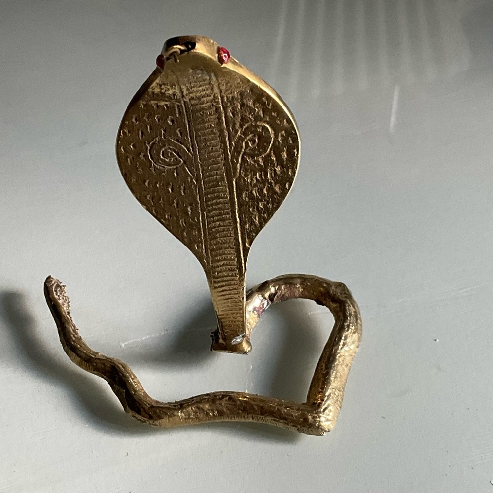 Brass Cobra With Red Eyes